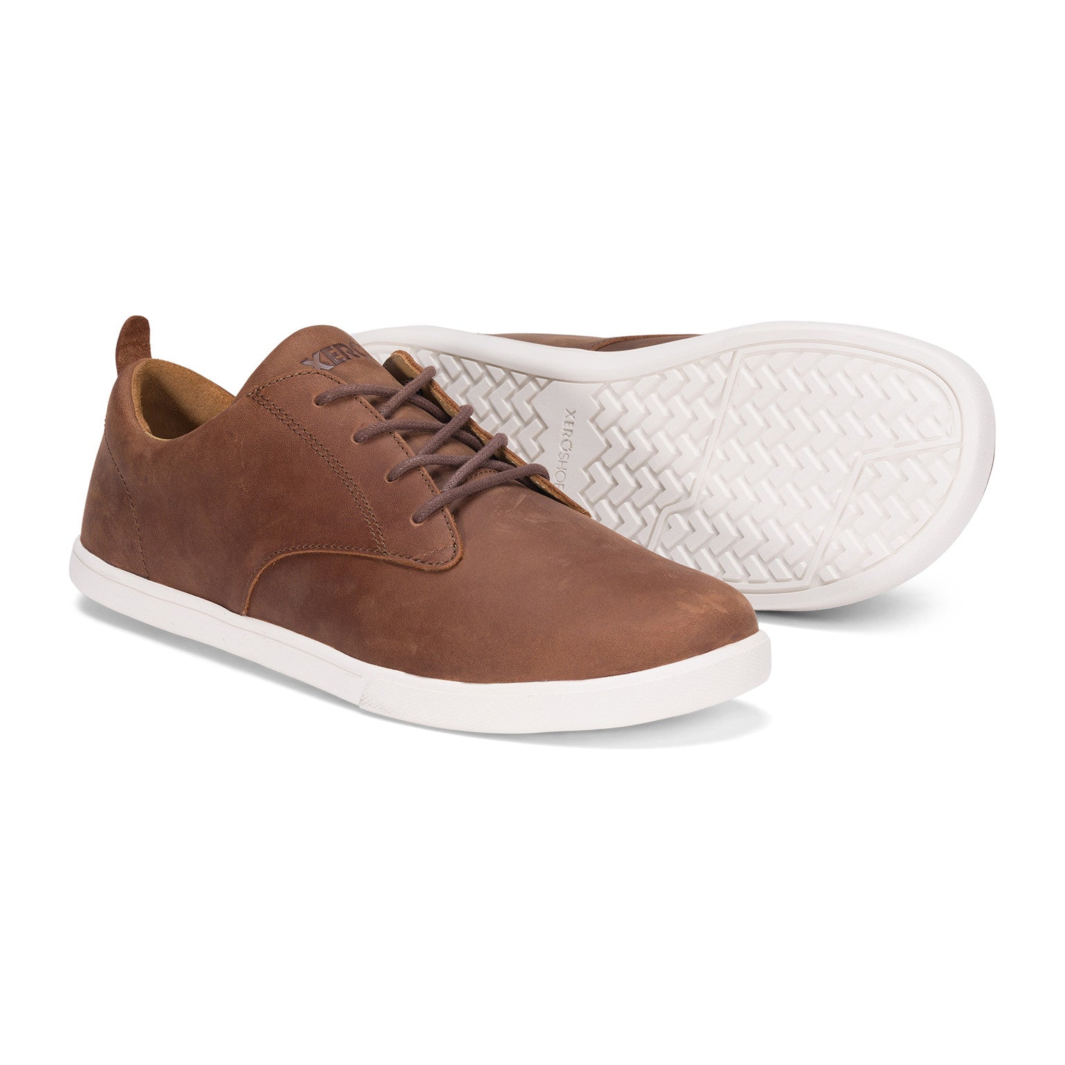 Xero Shoes Glenn Barfußschuhe für Herren in Braun aus Leder, bieten Flexibilität und Komfort für natürliche Fußbewegungen im Alltag. Die flexible Sohle sorgt für hervorragende Unterstützung und Leichtigkeit. Erhältlich in unserem Onlineshop für Barfußschuhe.