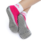 Leguanito Barfußschuhe für Kinder von Leguano in Pink – Sockenschuhe, Unteransicht, getragen von einem Kind, erhältlich im barfusswelteb.com Barfußschuhe Onlineshop