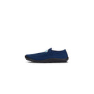 Leguanito Scio Blue (Größe 23 bis 28) Kinder Barfußschuhe Slipper – Seitenansicht von links, zeigt den komfortablen und flexiblen Slipper für Kinder, erhältlich im Barfußschuhe Onlineshop barfusswelteb.com.