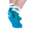 Leguanito Barfußschuhe für Kinder von Leguano in Türkis – Sockenschuhe, Unter- und Rückansicht, getragen von einem Kind, erhältlich im barfusswelteb.com Barfußschuhe Onlineshop
