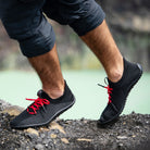 Leguano Inspiro Barfußschuhe in lava als Sportschuhe und Sneaker am Fuß im Onlineshop für Barfußschuhe